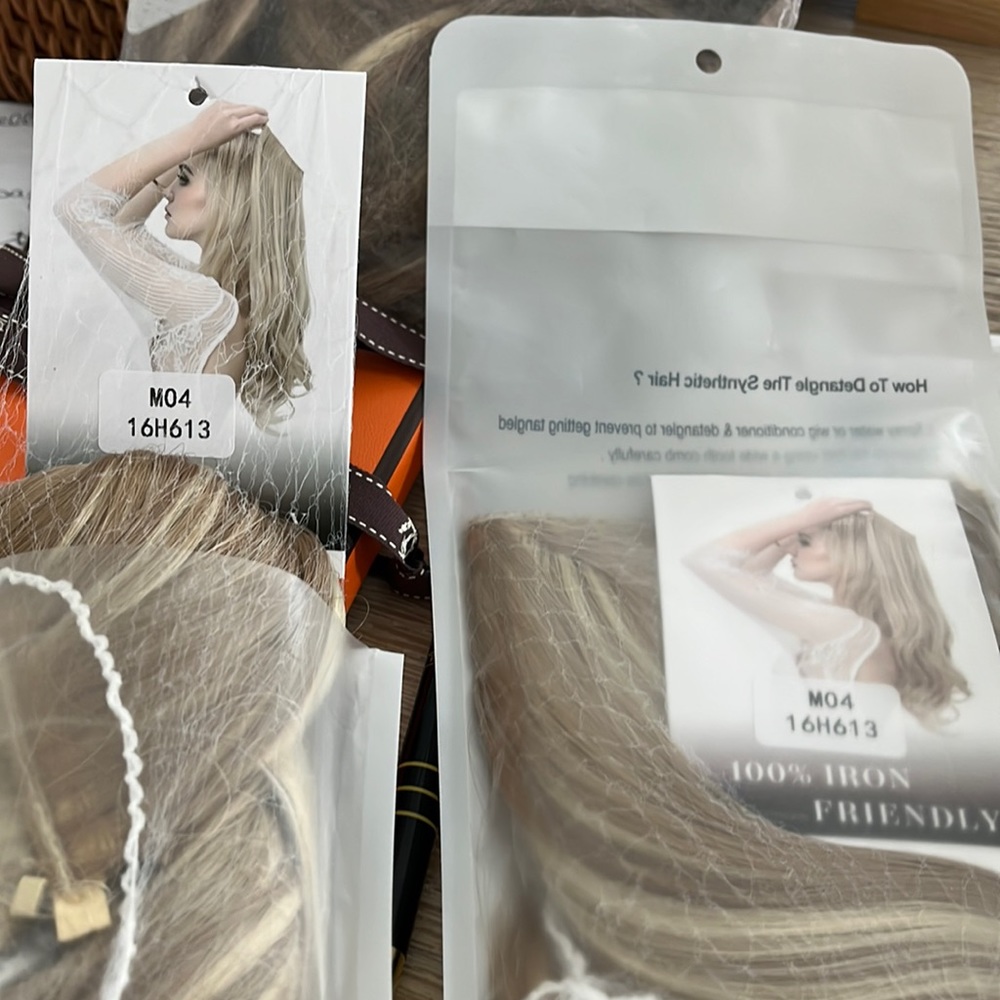 Lula hair extensions. 14” dirty blonde